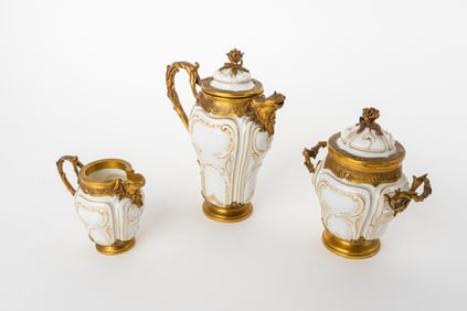 Paul Canaux & Cie. Partial Gilt Porcelain Coffee Service With Gilt Silver Mounts