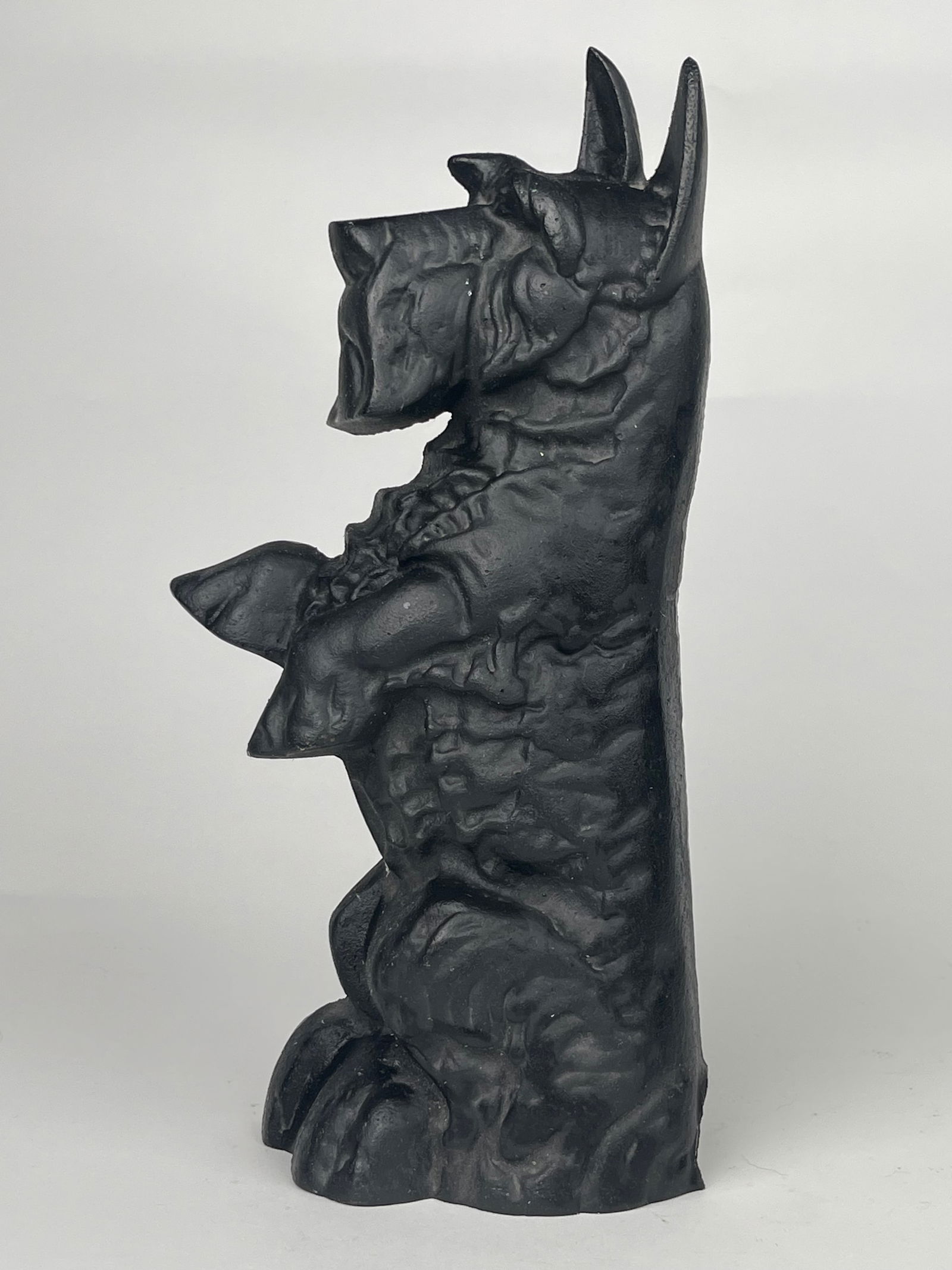 A Standing Scottish Terrier Cast Iron Doorstop: A Standing Scottish Terrier Cast Iron Doorstop. H: 14-1/4” W:6-3/4”