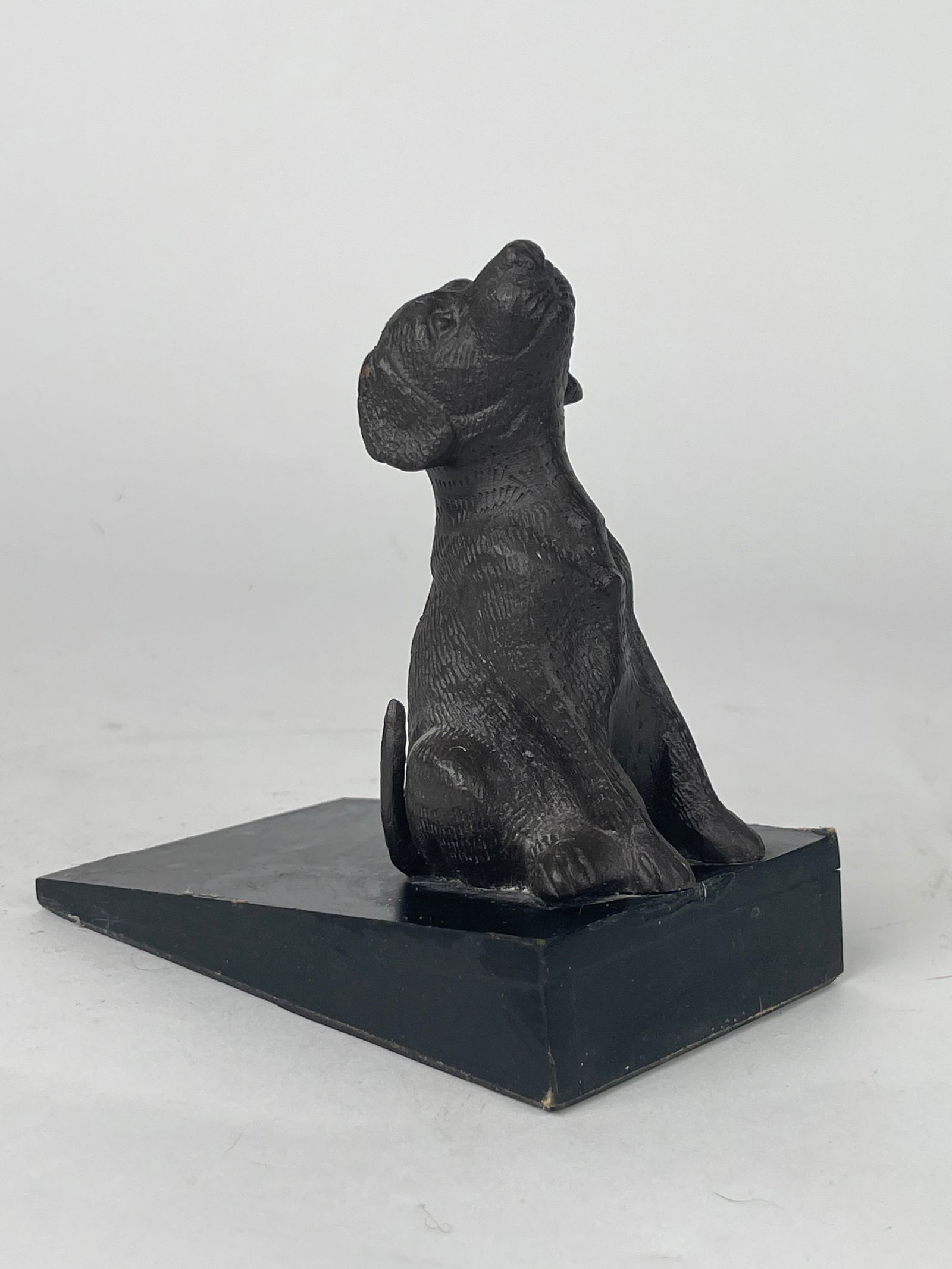 A Dog Cast Iron Door Stop: A Dog Cast Iron Door Stop. H: 5” W: 5”