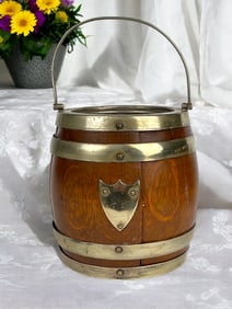 A British Oak & Bronze Ice Bucket