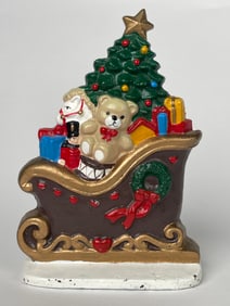 A Cast Iron Doorstop of Santa’s Sleigh Filled with Toys
