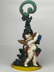 A Cast Iron Angel & Berries Doorstop
