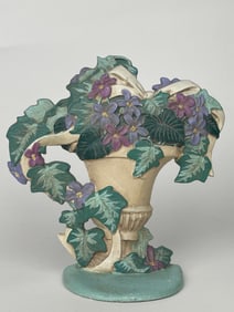 A Bouquet of Flowers in a Vase Cast Iron Doorstop