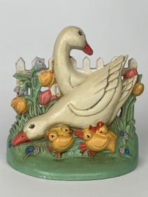 A Family of Ducks Surrounded By Flowers Cast Iron Doorstop