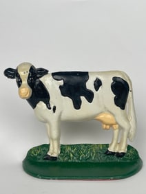 A Cast Iron Farm Cow Doorstop