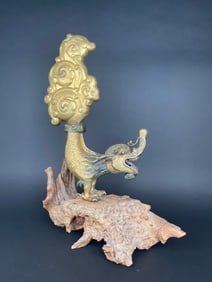 A Large Gilt Bronze Makara Finials, Tibet, Late 17th Early 18th Century