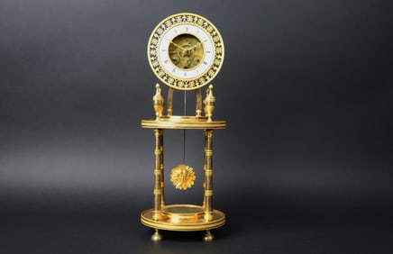 French Empire Gilt Bronze Mantel Clock. Circa 1810.