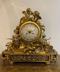 A French Large Gilt Bronze Mantel Clock. By FERDINAND BERTHOUD