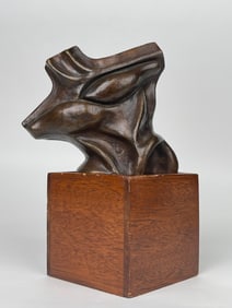 A Modern Patinated Bronze Torso Sculpture on a Wooden Stand