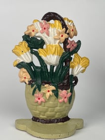 A Cast Iron Basket of Flowers Doorstop