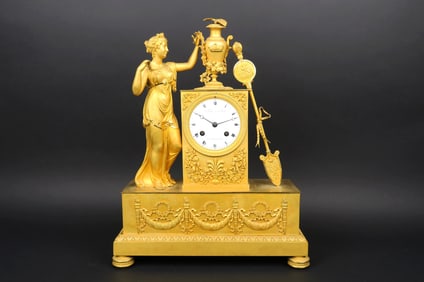 French Empire gilt Bronze Figural Mantel Clock. Circa 1810