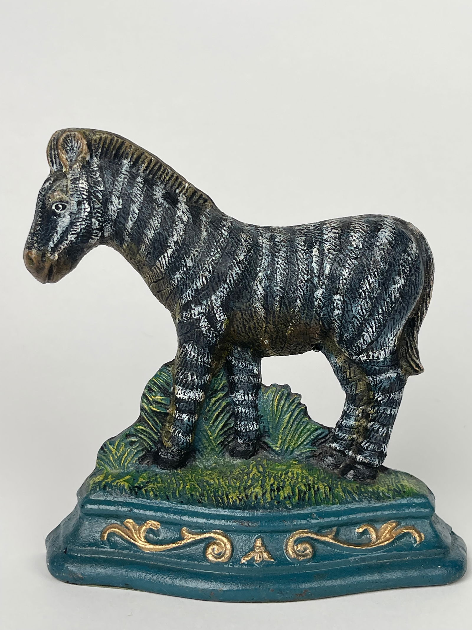 A Wild Zebra Cast Iron Doorstop: A Wild Zebra Cast Iron Doorstop. H: 6-1/4” W:6-3/4