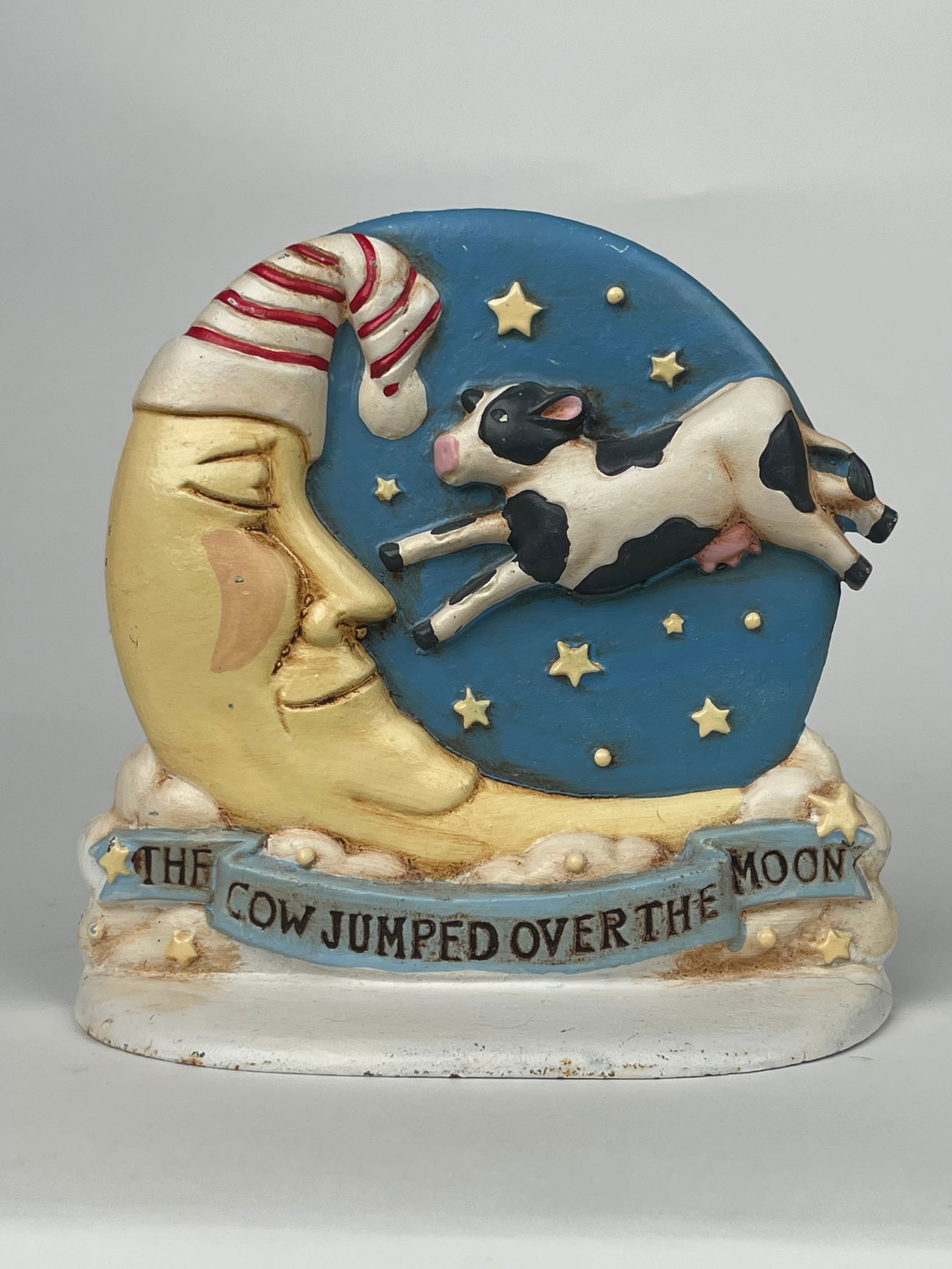 A Sleepy Moon & Flying Cow Cast Iron Doorstop: A Sleepy Moon & Flying Cow Cast Iron Doorstop. H:7” W:7-1/4”