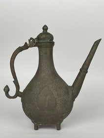 A Persian Hand Engraved Brass Pitcher