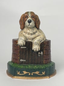 An Cast Iron Doorstop Figure Hound on Top of His Doghouse