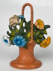 A Cast Iron Basket of Flowers Doorstop