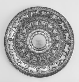 An Indian Silver Hand Made Chisiled Decorative Plate. India, 20th Century