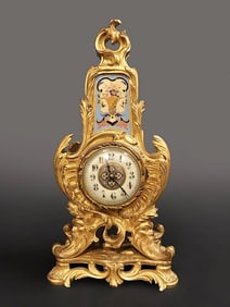 A French Chinoiserie Gilt & Patinated Bronze Clock