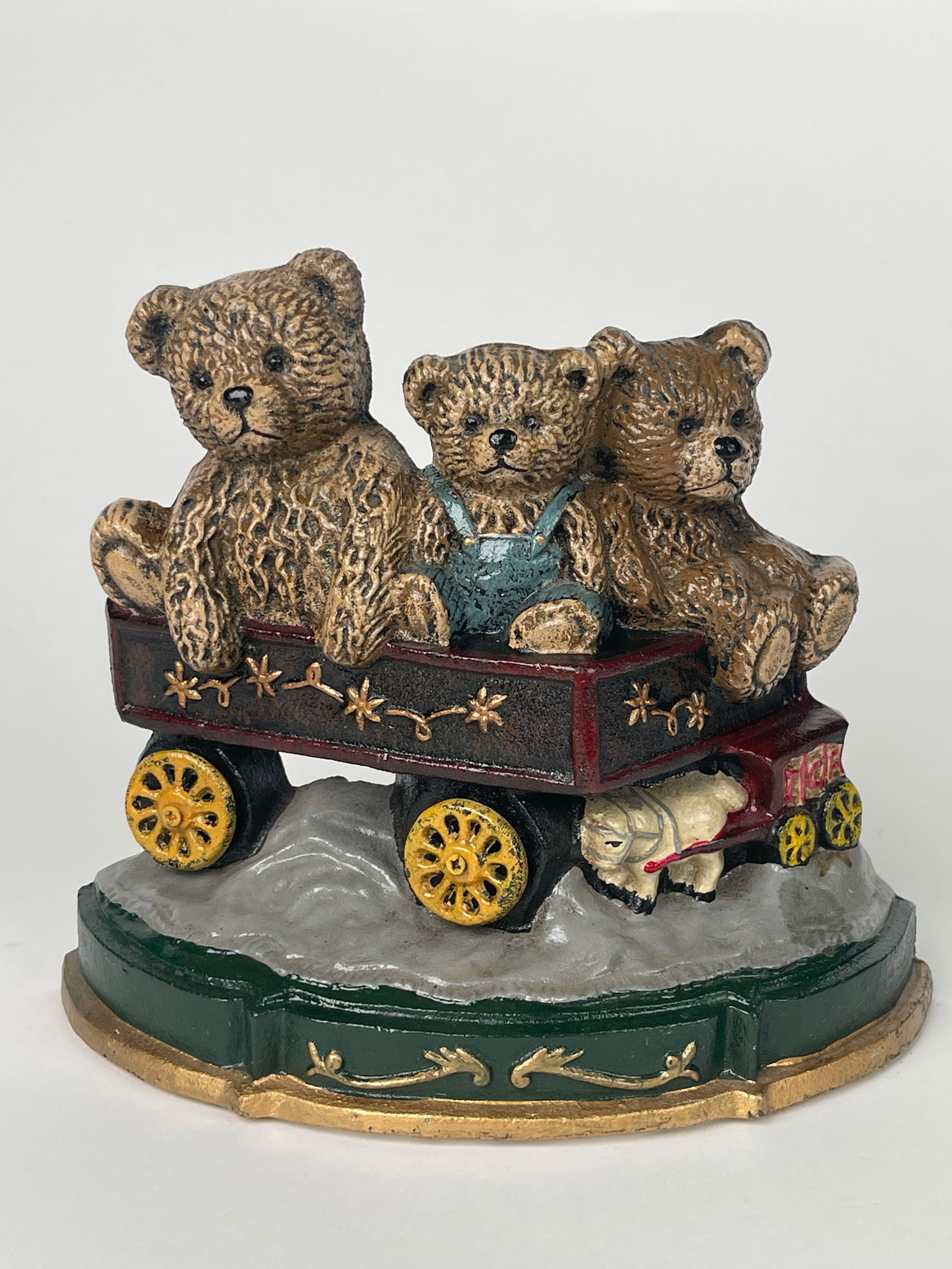 A Family of Bears on a Cast Iron Toy Train: A Family of Bears on a Cast Iron Toy Train. H: 7-1/2” W:9-3/8”
