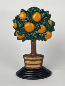 A Cast Iron Orange Tree With Brown & Golden Pot Doorstop