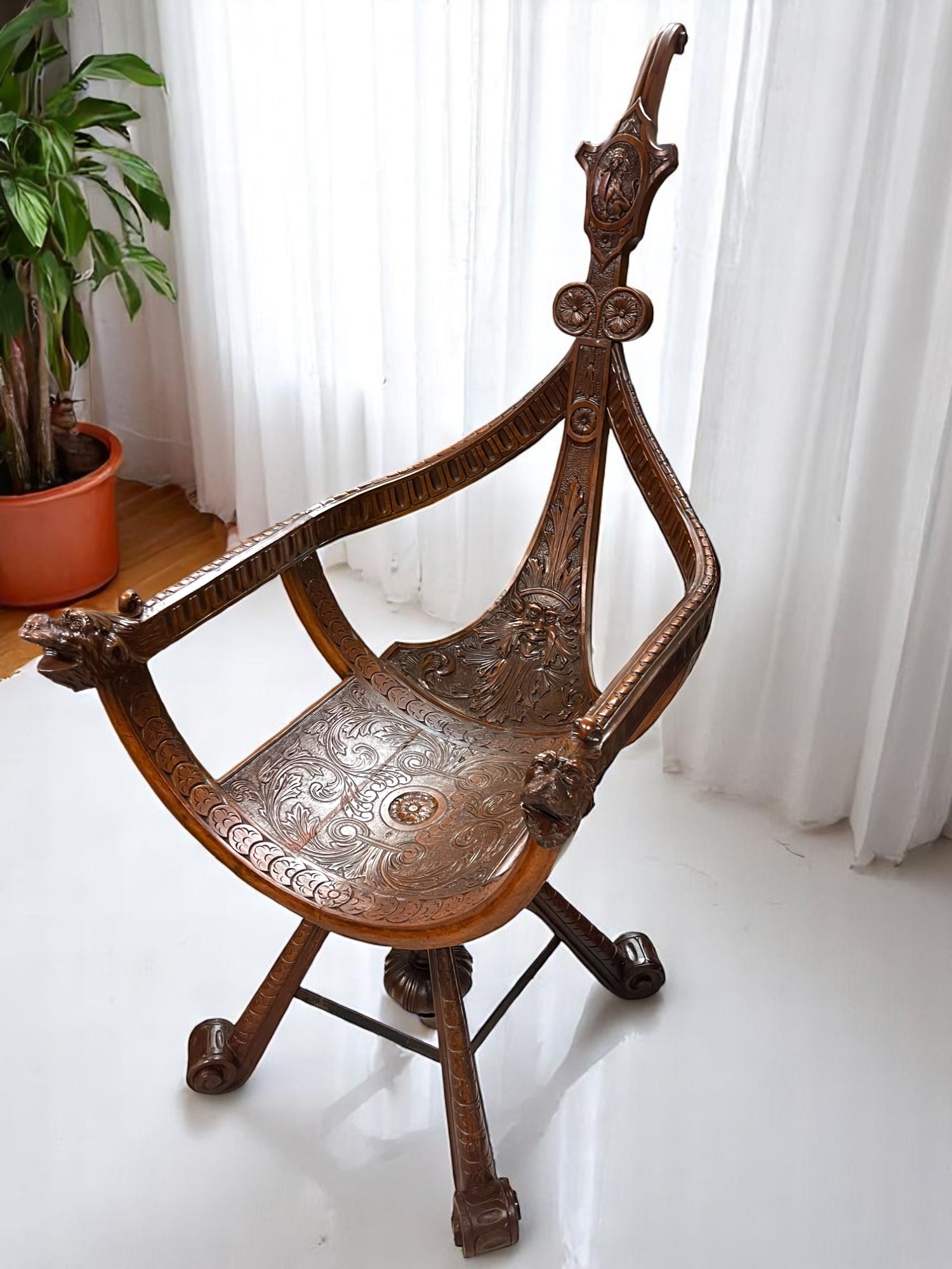 A 19th Century Italian Venetian Carved Walnut Gondola Chair: A 19th century Italian Venetian Carved Walnut Gondola chair. *This chair was fully restored*. 48" x 22"