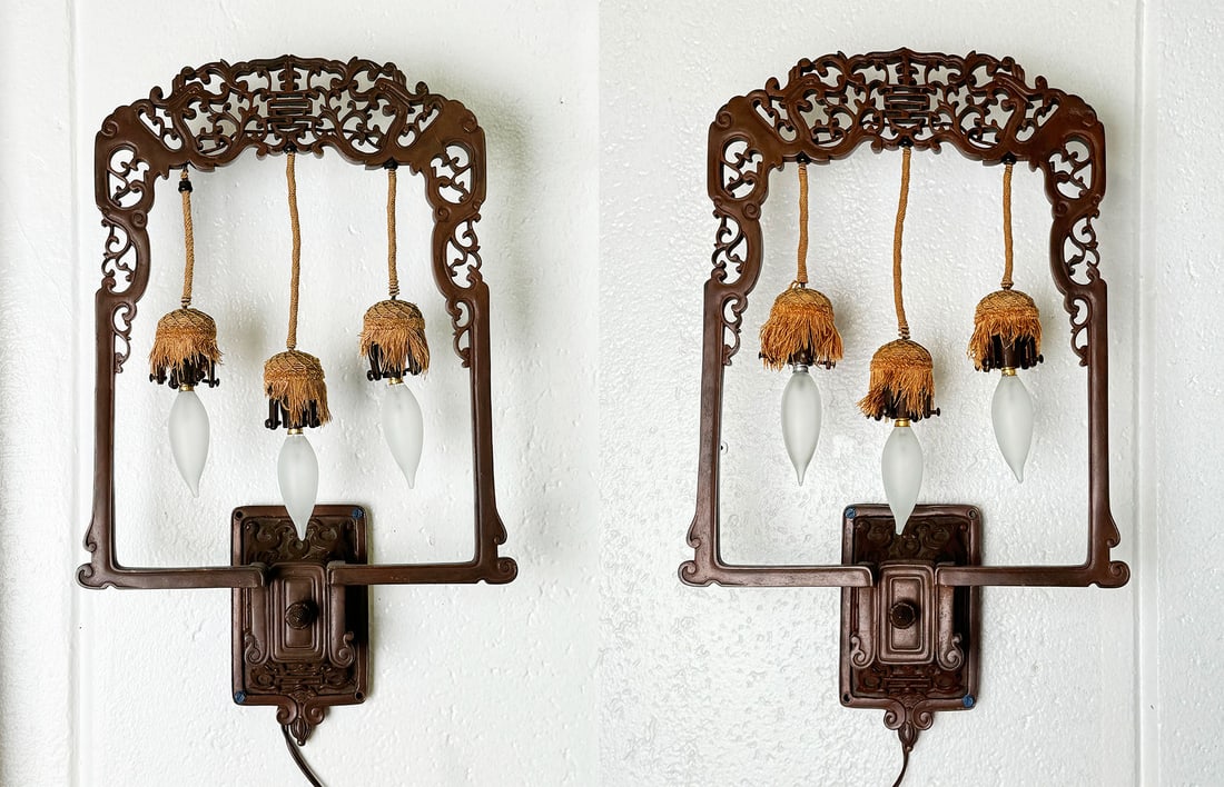 A Pair Of 19th Century French Chinoiserie Patinated Bronze Sconces: A Pair Of 19th Century French Chinoiserie Patinated Bronze Wall Lights - frames stamped 6517height of frame 21 1/2in (54.6cm); width 12in (30.4cm); depth 4in (10.1cm); height of shades 3 1/2in (8.8cm)
