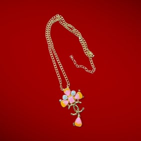 An Authentic 18k Gold Plated Pearl & Pink Enameled Chanel Necklace