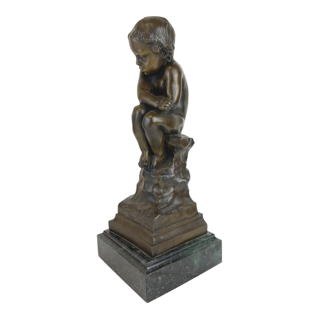 A Patinated Bronze Figure Of A Seated Cupid Circa 190 0: A Patinated Bronze Figure Of A Seated Cupid Signed EugÃ¨ne Marioton Circa 1900 EugÃ¨ne Marioton (7 April 1857, Paris - 1933) was a French sculptor and medalist. He was a brother of Claudius Mariot