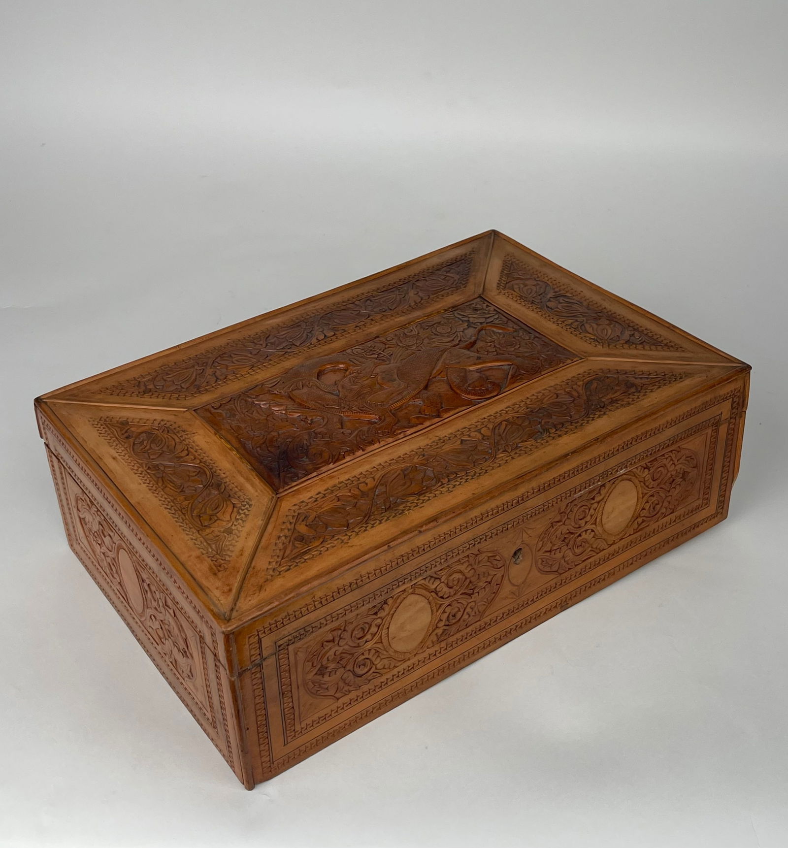 An Indian Hand Carved Jewelry Box: An Indian Hand Carved Jewelry Box. India, Circa 1920s L: 14-1/2” D: 9-3/4” H: 4-1/2”
