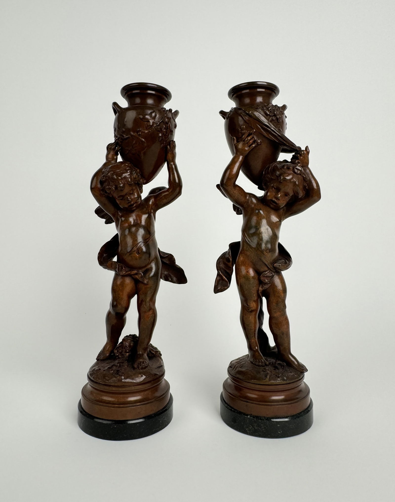 Magnificent Pair Of French Patinated Bronze Candlesticks By Moreau, Circa 1880: 19th Century Pair Of French Patinated Bronze Candlesticks By Auguste Moreau. Signed: Aug. Moreau. Foundry Mark: E. Colin & Cie. Paris10-3/4"x3".Auguste Moreau (1834–1917) was a notable French sculpt