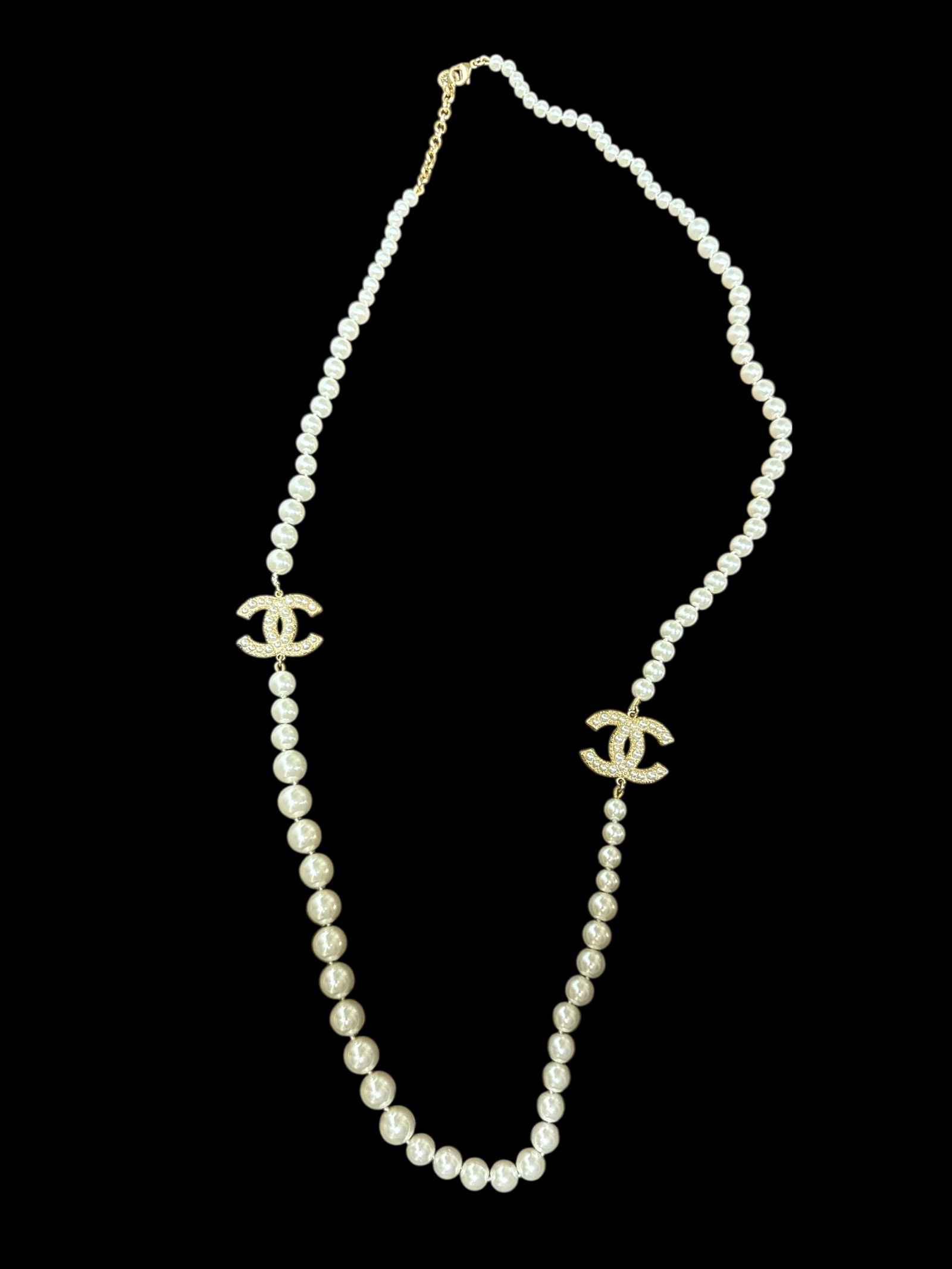 An Authentic 18K Gold Plated Pearl Chanel Necklace: An Authentic 18K Gold Plated Pearl Chanel Necklace. Stamped Chanel Necklace On The clasp.