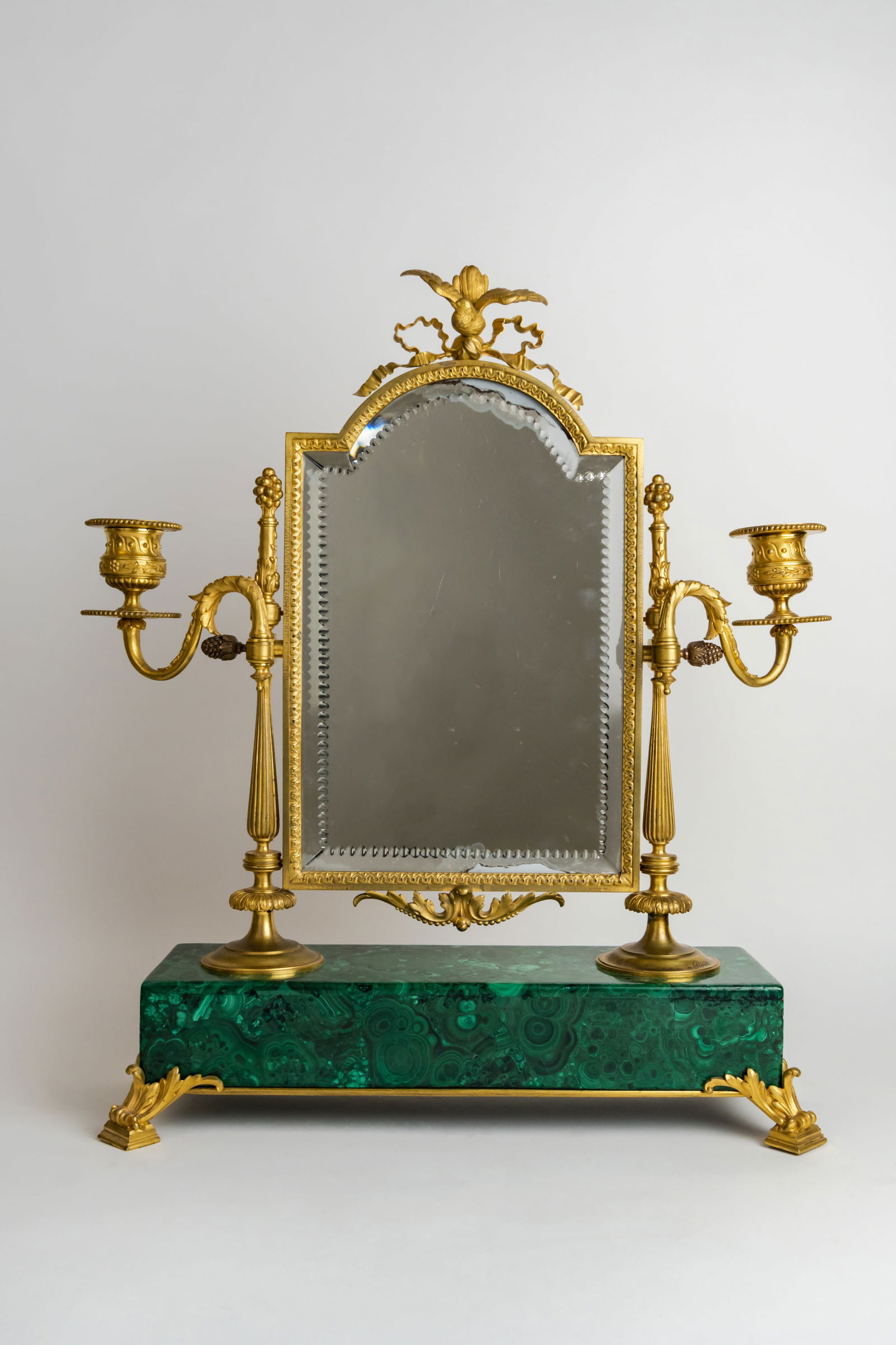 Magnificent Gilt Bronze Mirror Mounted On Malachite Base By Giroux: 19th Century French Ormolu Mirror Mounted On A Malachite Base By Alphonse Giroux A Paris.H: 17" L: 15" D: 5".Francois-Simon-Alphonse Giroux (6 April 1776, Paris - 1 May 1848, Paris) was a French art r
