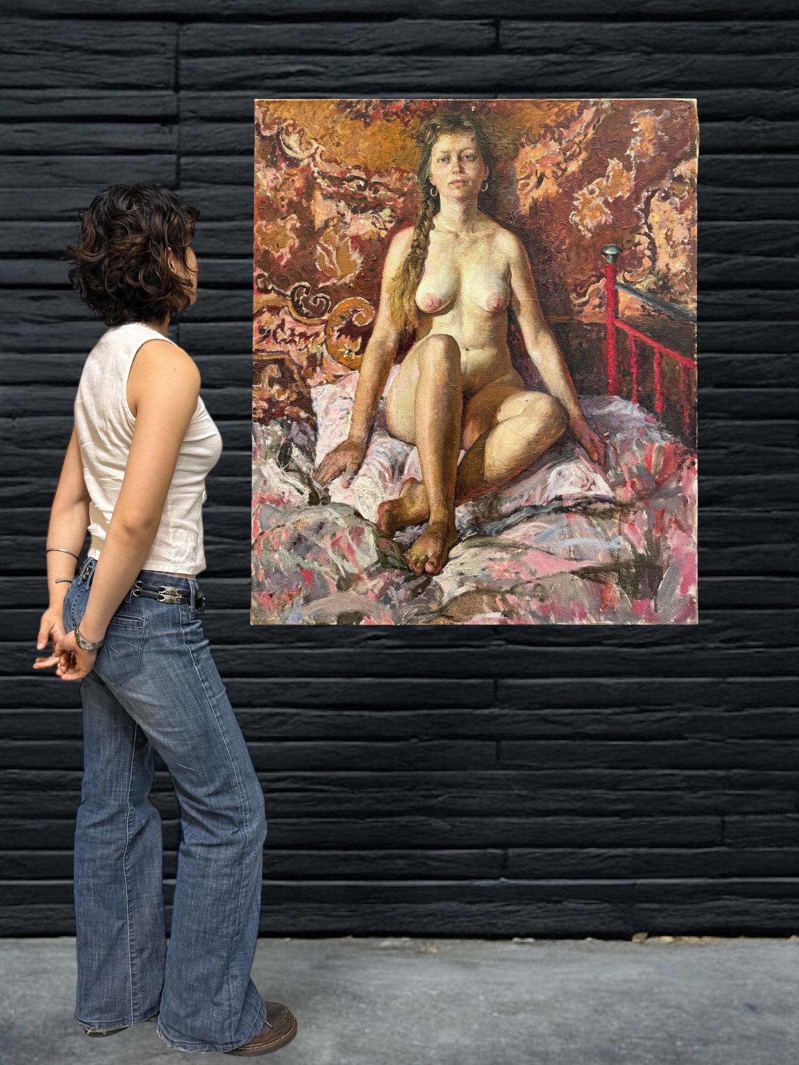 An Oil On Canvas Painting Of a Seated Nude on a Patterned Bed by Viktor Lyapkalo: An Oil On Canvas Painting Of a Seated Nude on a Patterned Bed by Viktor Lyapkalo. Russia, 20th Century This striking oil painting captures a nude female figure seated on a richly textured bed, surroun