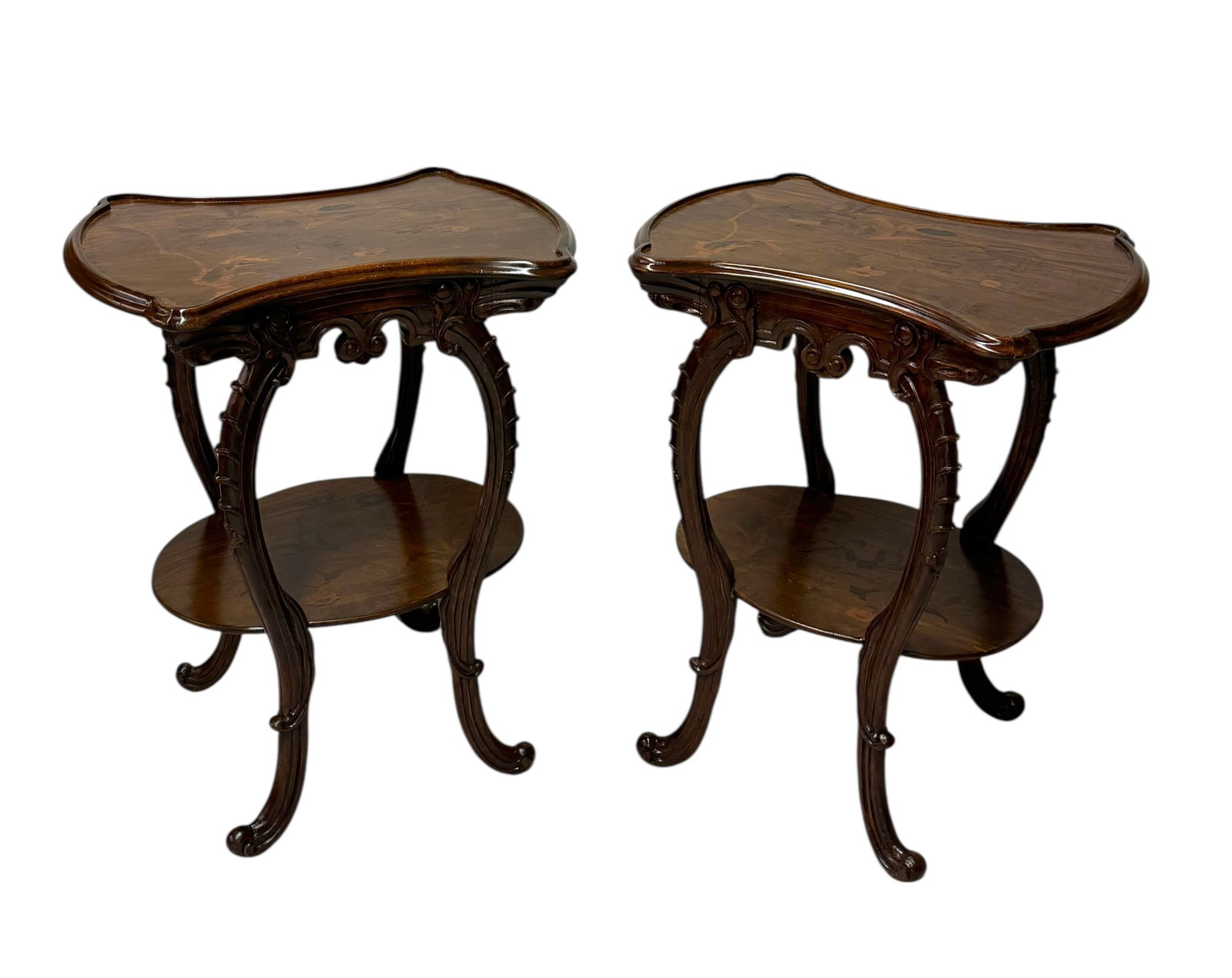 Pair of French Art Nouveau Louis Majorelle Style Inlaid Side Tables: Pair of French Art Nouveau Louis Majorelle Style Inlaid Side Tables.A charming and elegant pair of French Art Nouveau side tables, featuring shaped serpentine tops finely decorated with floral