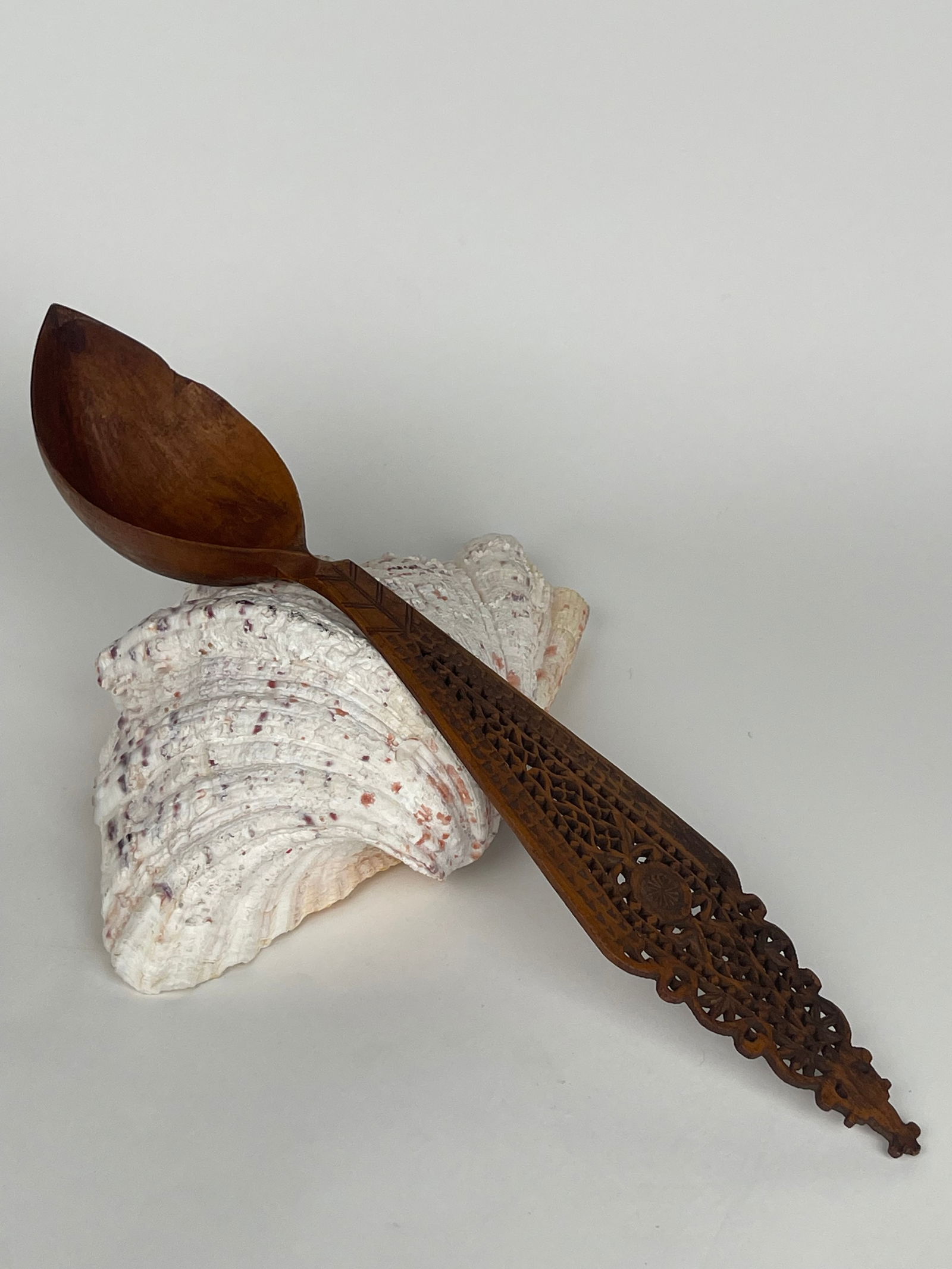 A Persian Qajar Hand Carved Wooden Sherbet Spoon. Iran, Circa 1880: A Persian Qajar Hand Carved Wooden Sherbet Spoon. Iran, Circa 1880. 14-1/2”