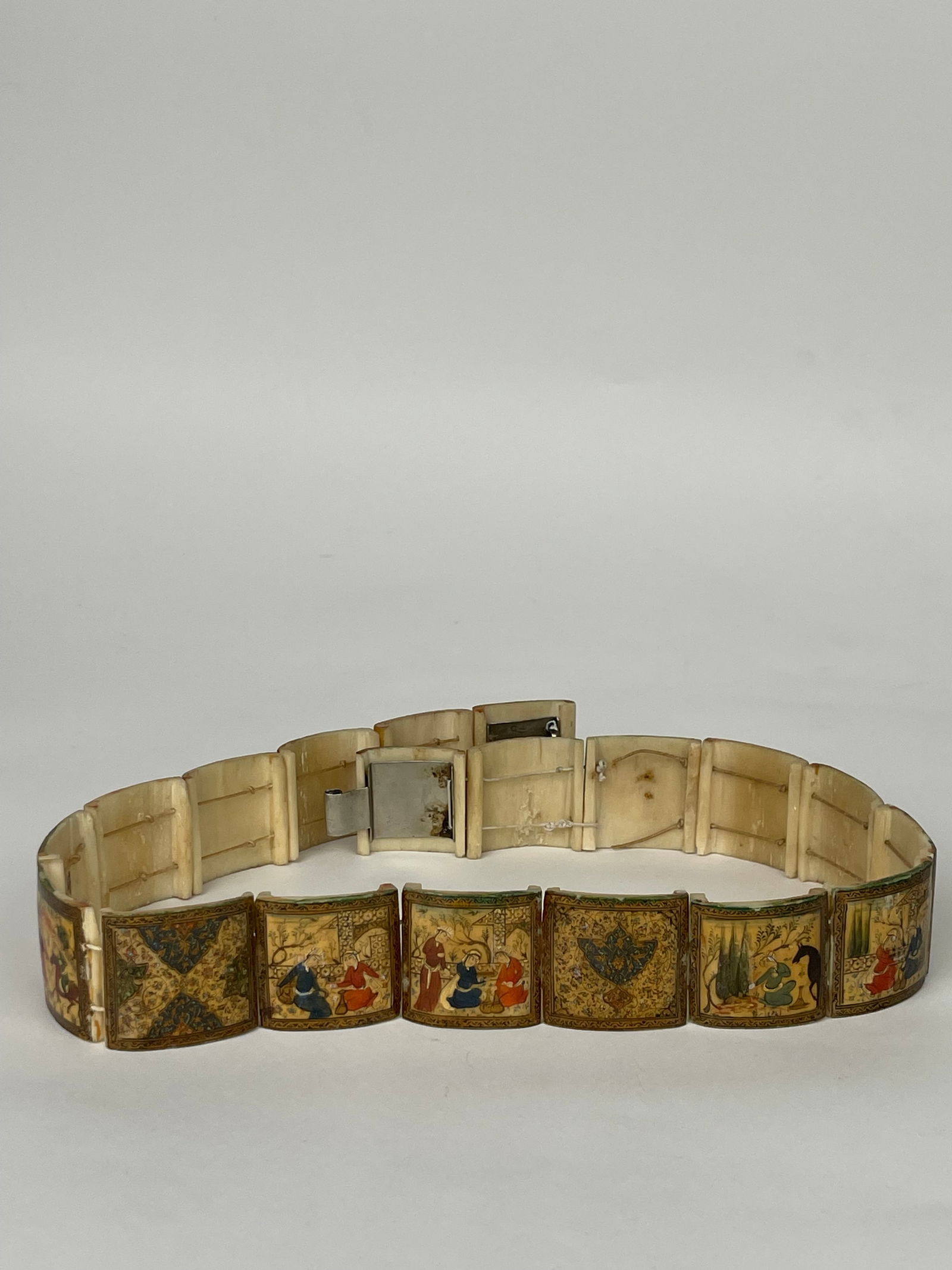 A 20th Century Persian Hand Painted Bone Belt. Isfahan, Circa 1920: A 20th Century Persian Hand Painted Bone Belt. Isfahan, Circa 1920. 1-1/2” x 30”