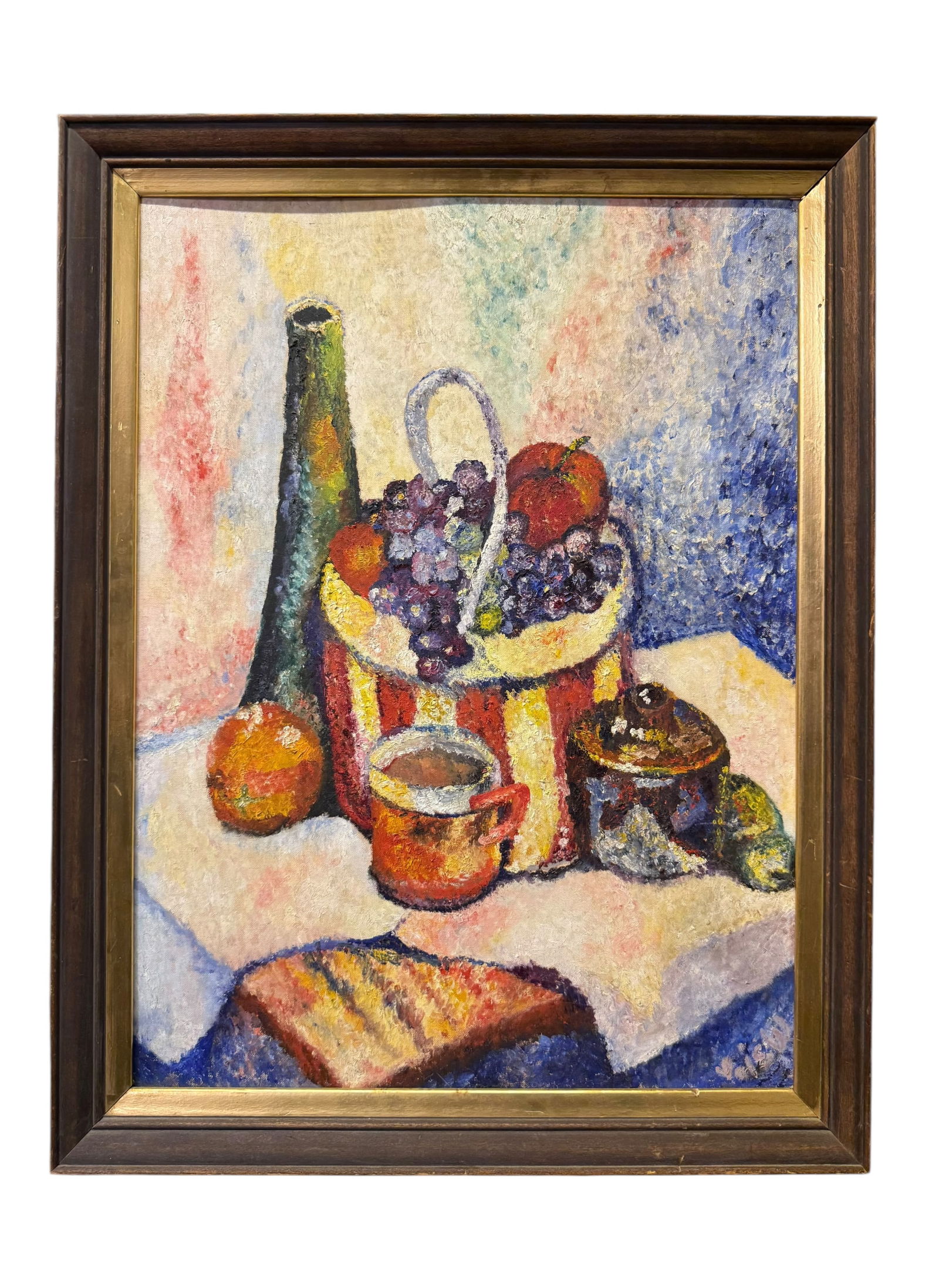 A Continental Impressionist Oil On board Still Life Painting: Oil on Board Still Life Painting. Charming oil on board still life painting depicting a tabletop arrangement featuring a tall bottle, a handled basket overflowing with grapes and fruit, a cup, and