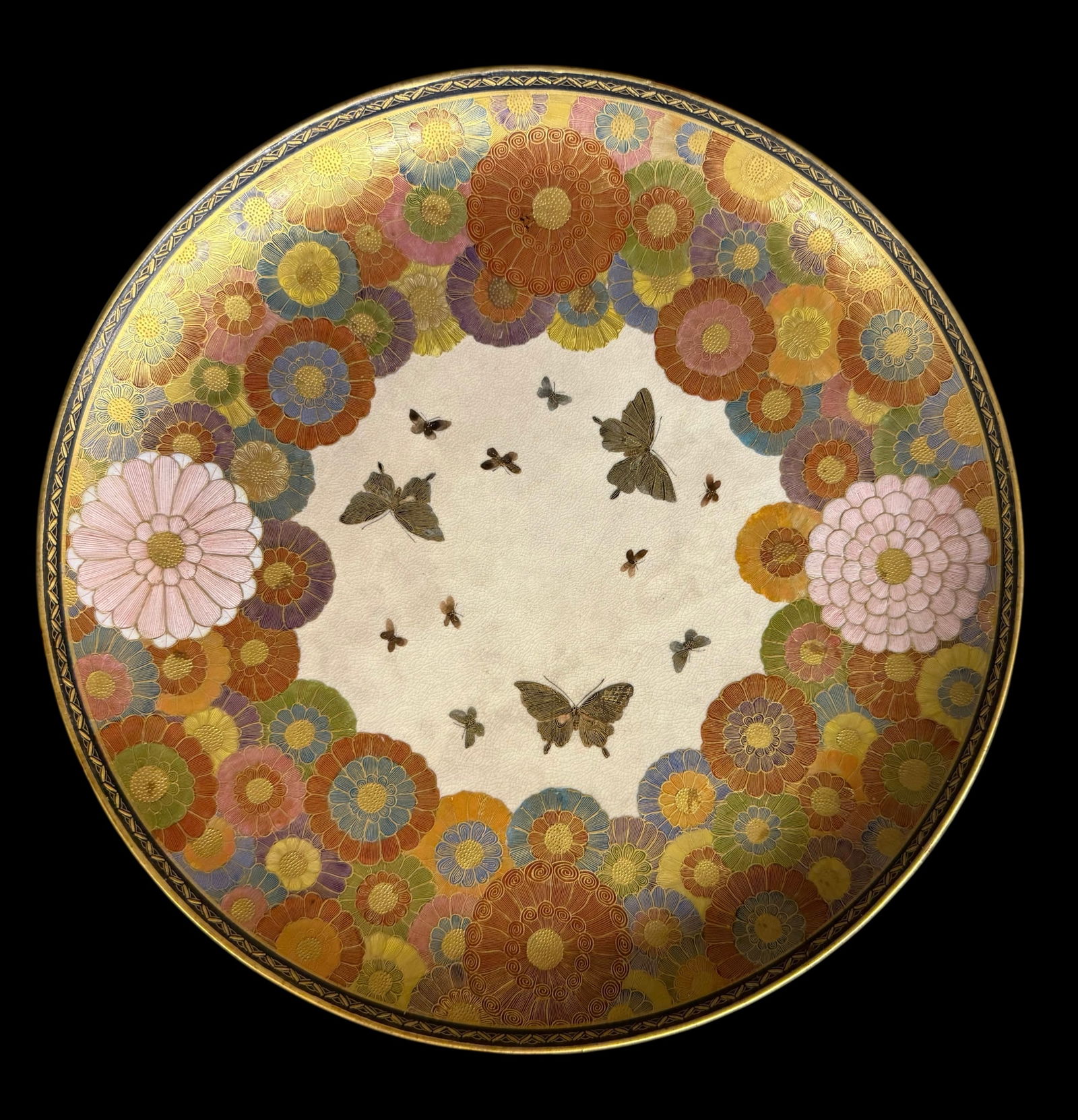 A Japanese Meiji Period Decorative Satsuma Porcelain Plate: A Japanese Meiji Period Decorative Satsuma Porcelain Plate Depicting Butterflies & Flowers. Signed By the Artist. Japan, Circa 1900.