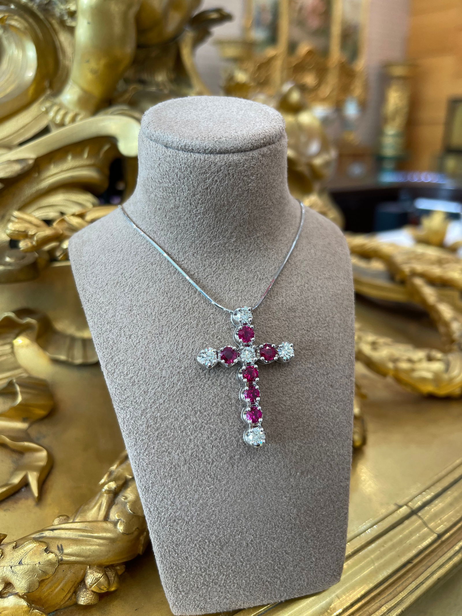 14k White Gold Diamond & Ruby Cross Necklace: 14k White Gold Diamond & Ruby Cross Pendent. Ruby: 2.08cts Diamond: 1.33cts Total Weight: 6grams Please note: the chain is not included.