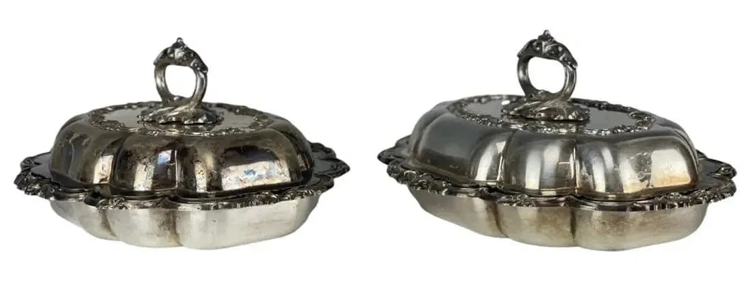 A PAIR OF SILVER PLATED STEW DISH: A PAIR OF SILVER PLATED STEW DISH. Circa 1940. Measures 13 inches long. In good condition.