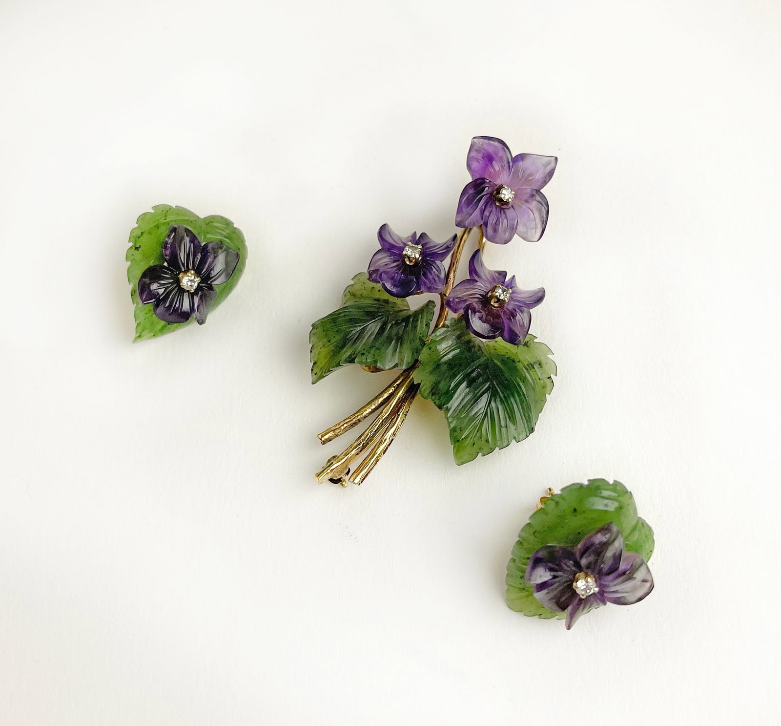 Set Of 14K Gold, Nephrite & Amethyst Earrings & Brooch: Set Of 14K Gold, Nephrite, Amethyst & Diamond Earrings & Brooch. The earrings and brooch beautifully carved out of Nephrite & Amethyst in the form of flowers and mounted on 14k gold. total weight: