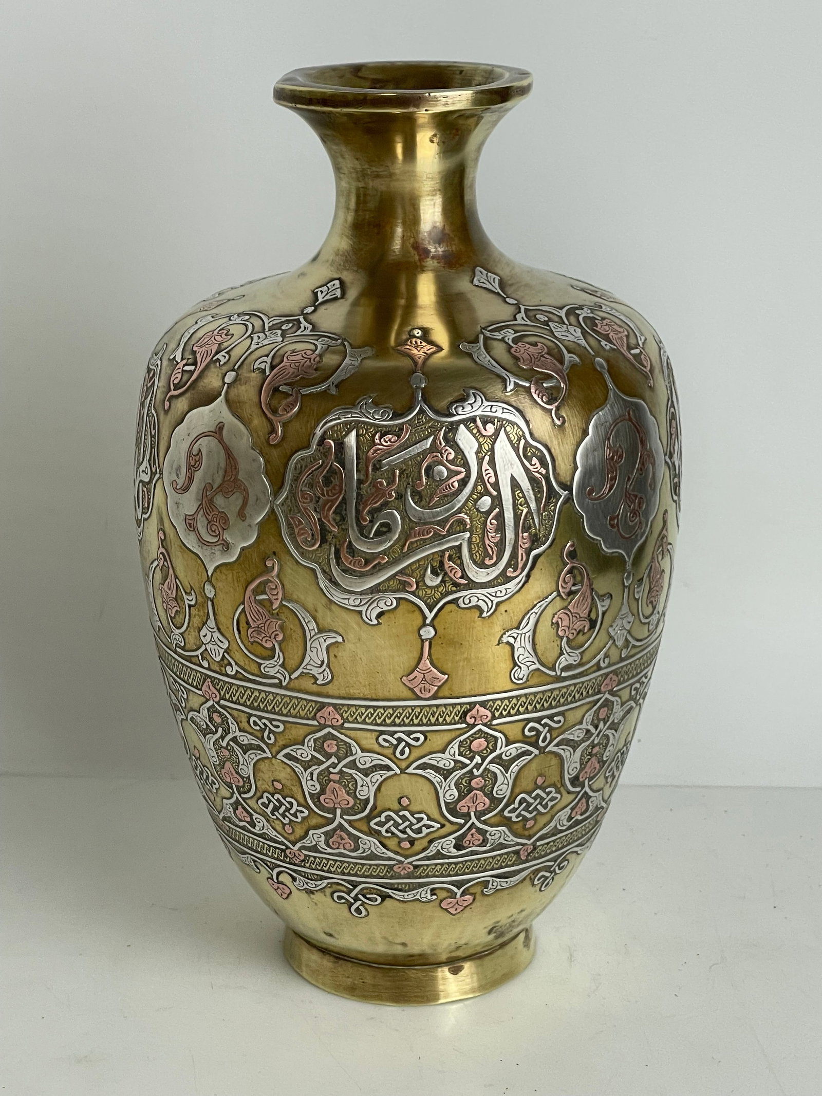 A Middle Eastern Silver Inlaid Vase - 4