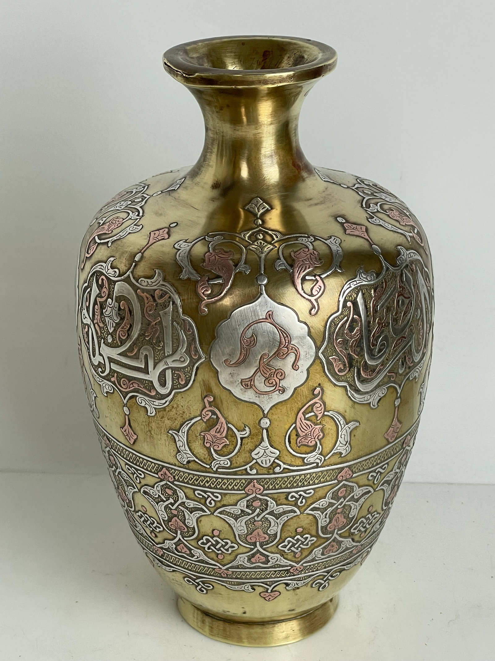 A Middle Eastern Silver Inlaid Vase - 5