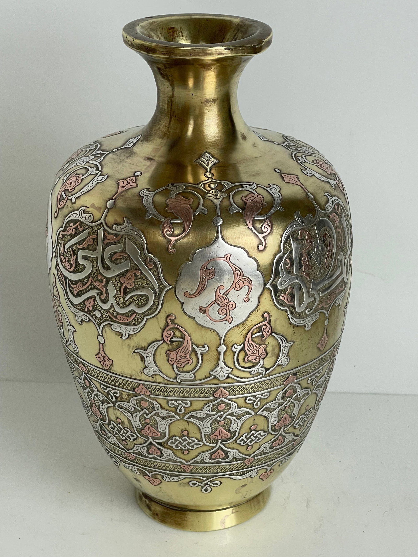 A Middle Eastern Silver Inlaid Vase - 7