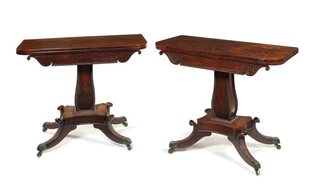 Pair Regency Scottish rosewood carved tea tables: A pair of Regency Scottish rosewood carved tea tables The rounded rectangular swivel tops above beaded and scrolling lotus carved friezes, unusually with full veneered friezes and plain spandrels to t