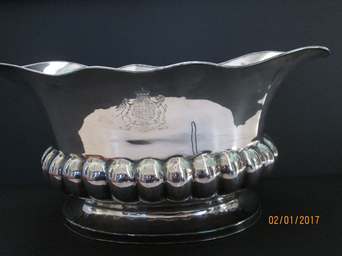 Sheffield wine cooler: English wine cooler, Sheffield, circa 1830, J. Watson & Son, 7.25”h x 15.625”l x 8.5”w, lion and griffon flanking crest stamped “Forward”