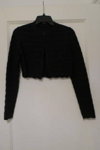 Azzedine ALAIA, Paris: Jet Black Sweater Cropped waist with long sleaves, top snap closure, with zig-zag design. Marked 'Made in Italy'. Size 38. (Piece is jet black, camera flash distoring color.)