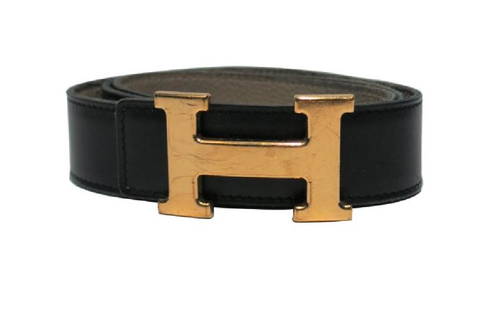 HERMES Constance Leather and Gold Belt: A classic HermeÌ€s Black / Grey (reversible) leather belt with iconic 'Constance' 'H' gold tone metal removable belt buckle, with tonal stitching on leather belt. Maker's mark (HERMES) and marked '