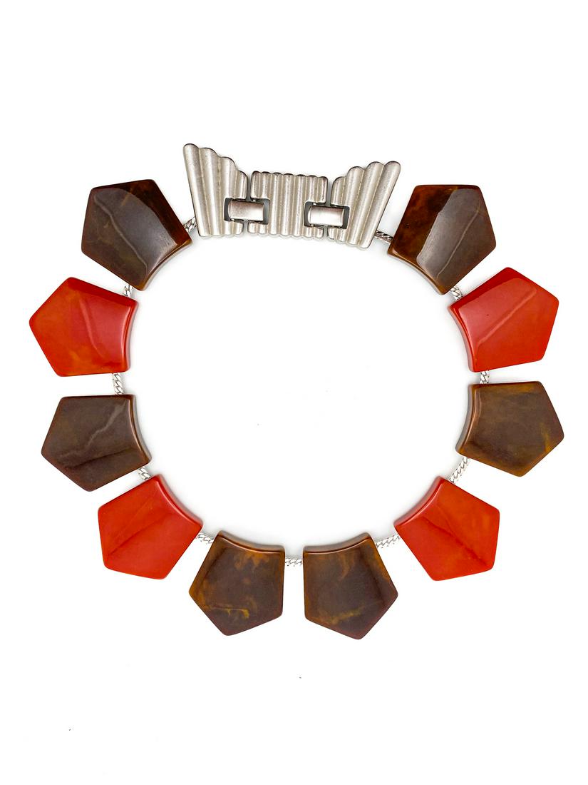 Vintage Yves Saint Laurent Necklace.: 1970/80. Collar necklace, silver metal wire, with dangling geometrical pentagon tiles, in shiny variegated acrylic, rusty and brown color, in alternate pattern. Designed light silver clasp. YSL etched