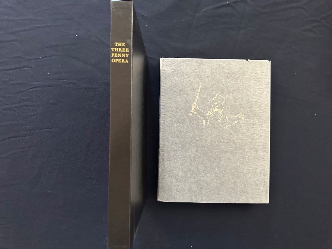 The Threepenny Opera, by Bertolt Brecht, 1982: Of this edition, 2,000 copies have been printed for the members of The Limited Editions Club. This copy is number 1982 and is signed by Jack Levine and Eric Bentley. Black cloth gold embossed design a